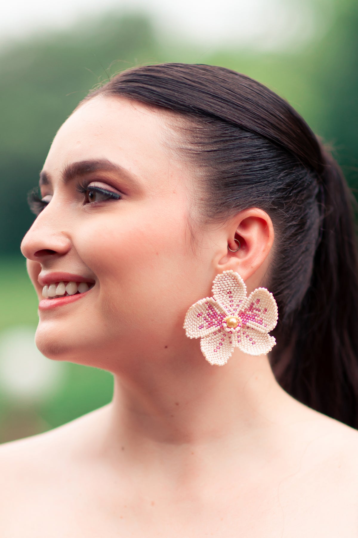 Ivory Orchid Earrings - handcrafted Czech bead flower earrings worn
